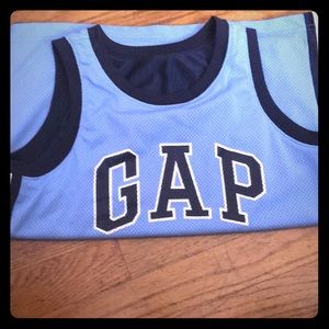 A variety of 8 shirts sizes s-xl for boys.